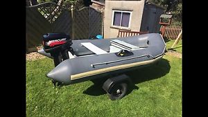 avon 310 rib with 9.9 mercury outboard and trailer