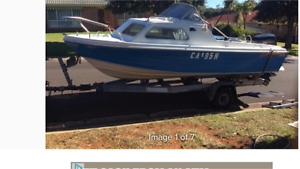4.9mtr Half Cabin with 115hp Evinrude motor