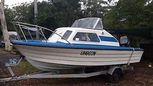 5.1 metre half cabin boat with 150hp Johnson outboard and trailer