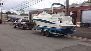 2005 Four Winns 248 Vista with trailer.