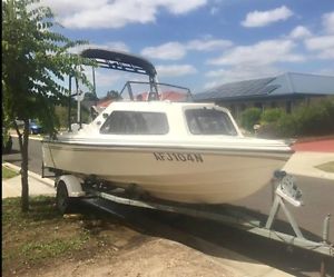 19 Foot Half Cabin Boat, 140HP Johnson