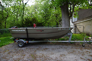 Tracker V12 Guide, Fully Carpeted With Floor, 8hp Mercury, Trailer